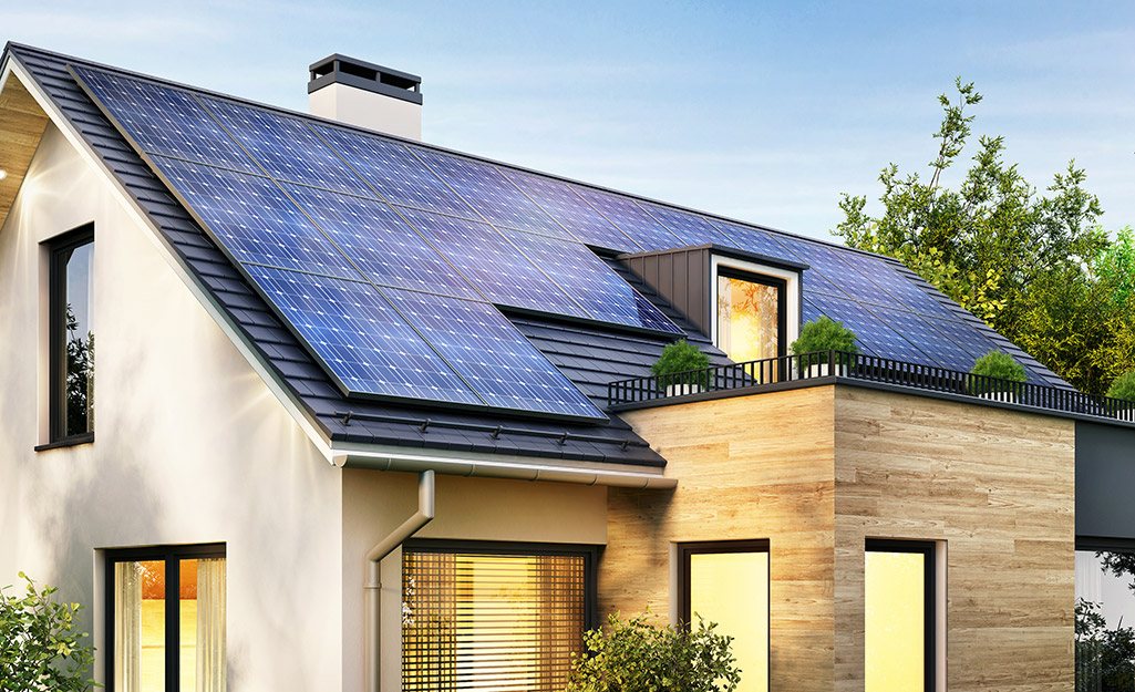 Residential roof with solar panels in the afternoon light
